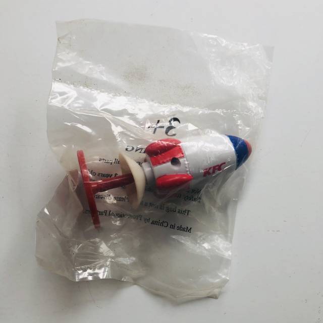 KFC Push Down Leaping Rocket toy 1990s