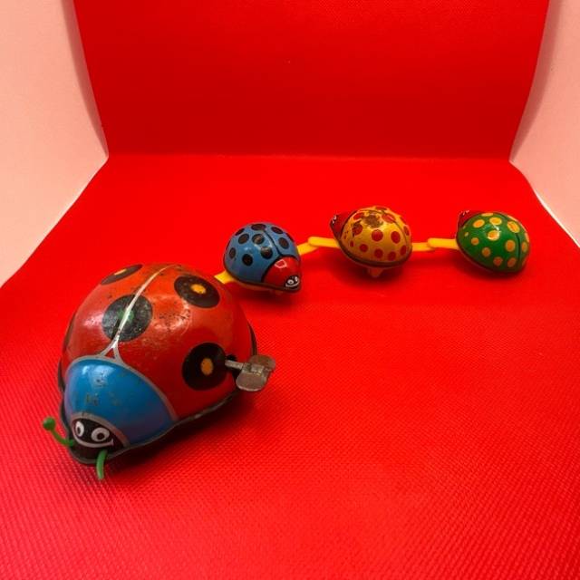Tin Toy Lady-Bug Family Parade Wind-up Toy V...